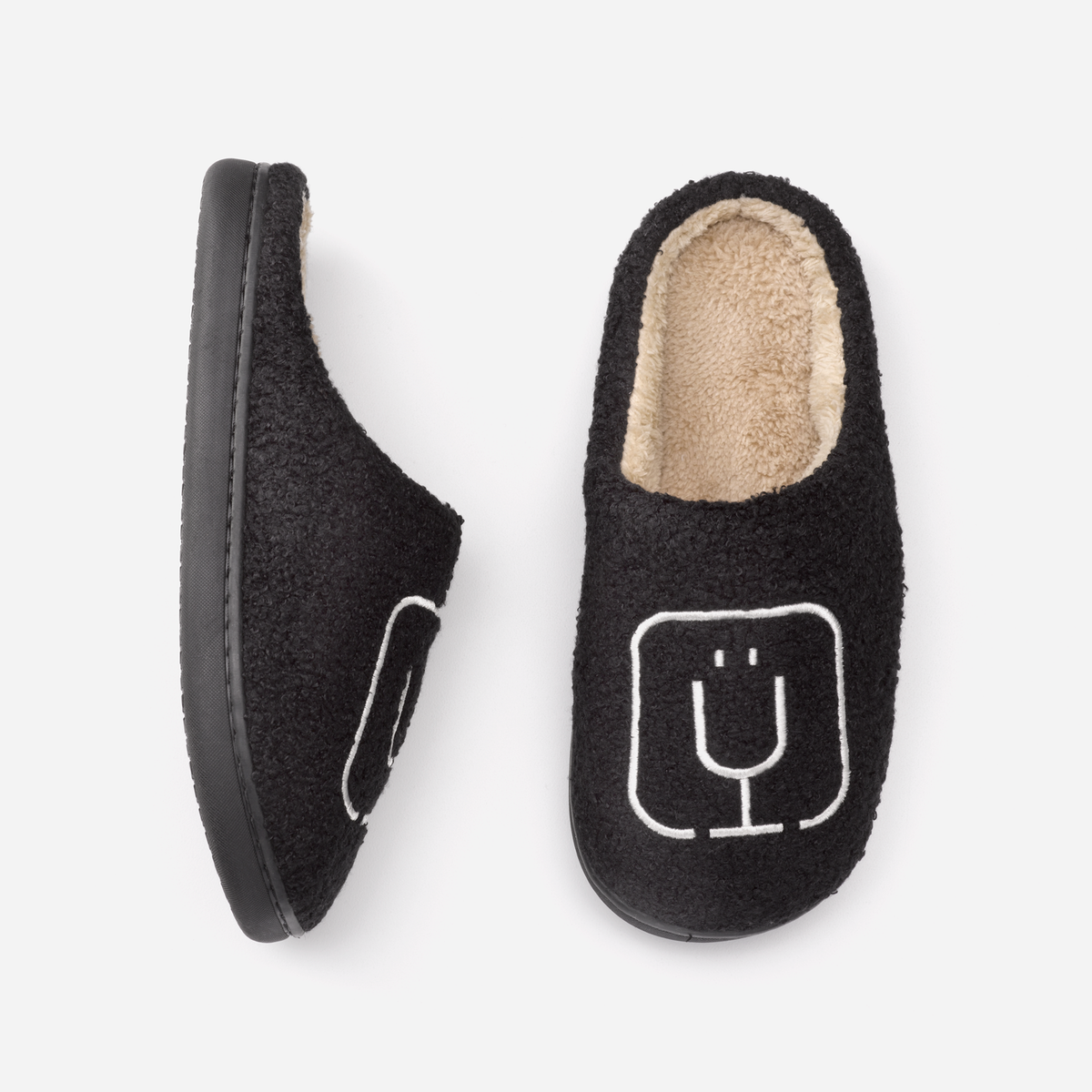 brumate-fuzzy-slippers-black-v3 apparel-slippers-above.png